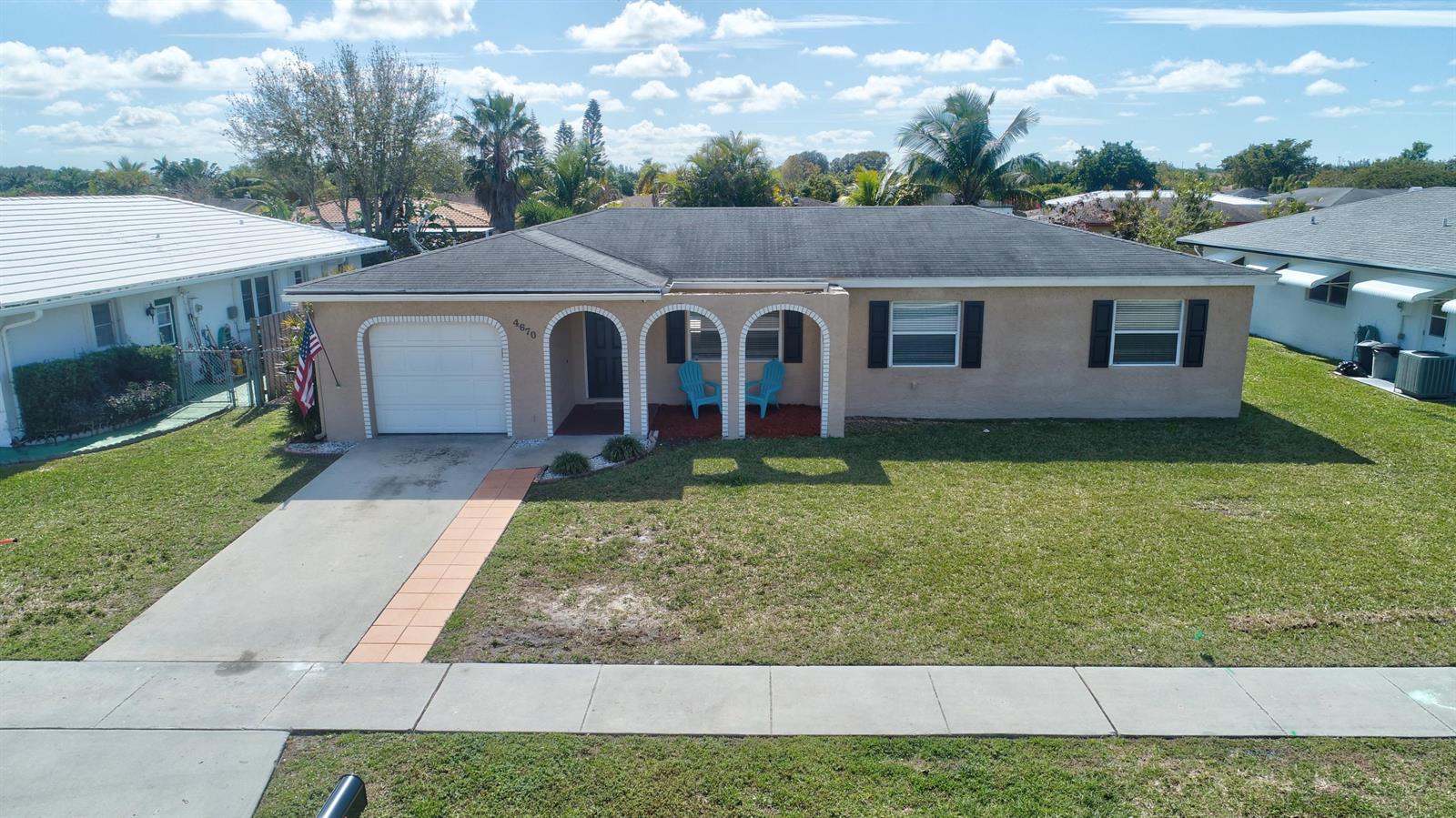 4670 Betelnut Street Boca Raton, FL 33428 - Photo 1 of 36 Front