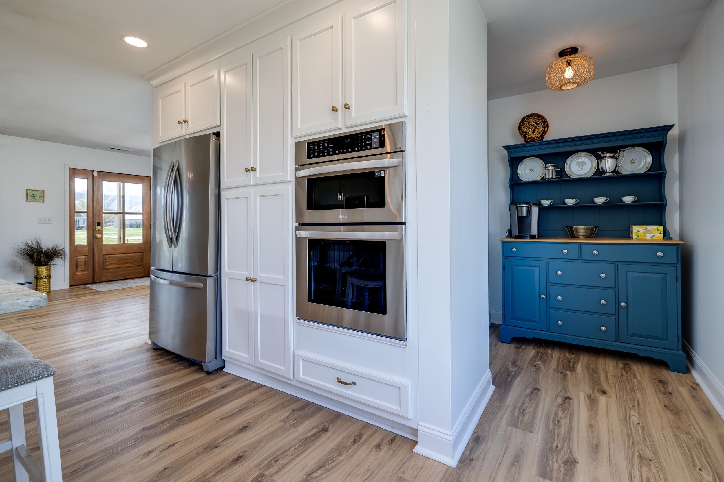 901 Riverside Avenue Grottoes, VA 24441 - Photo 11 of 75 a kitchen with stainless steel appliances a refrigerator and a stove top oven