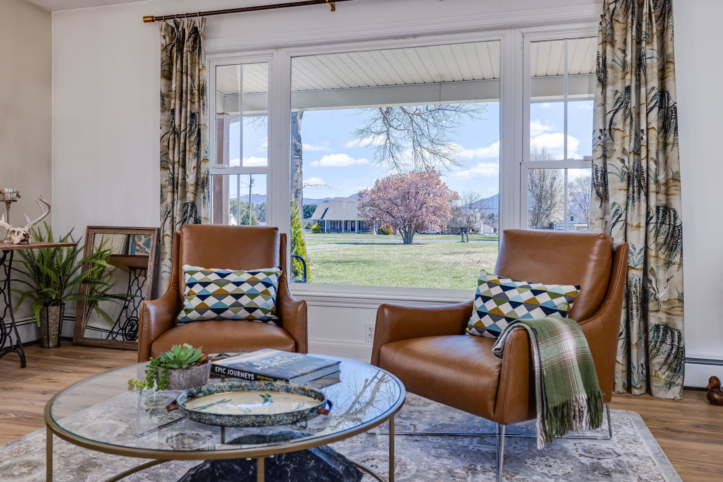 901 Riverside Avenue Grottoes, VA 24441 - Photo 31 of 75 a outdoor living room with furniture and a floor to ceiling window