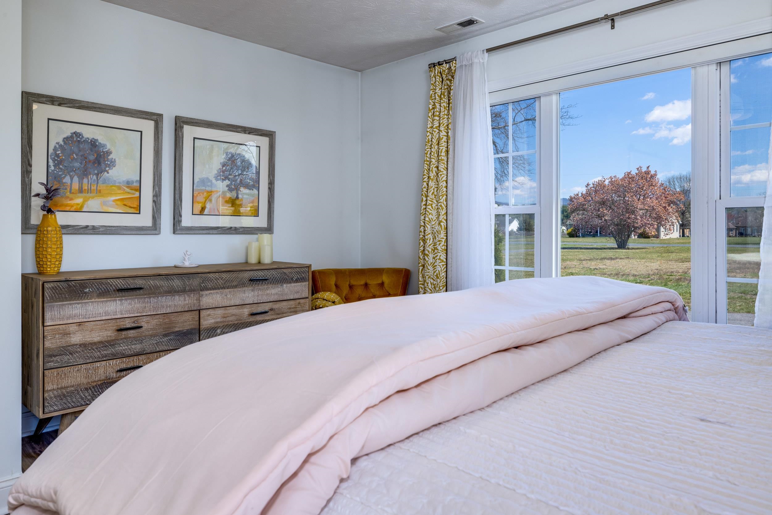 901 Riverside Avenue Grottoes, VA 24441 - Photo 41 of 75 a bedroom with a bed and a painting on the wall