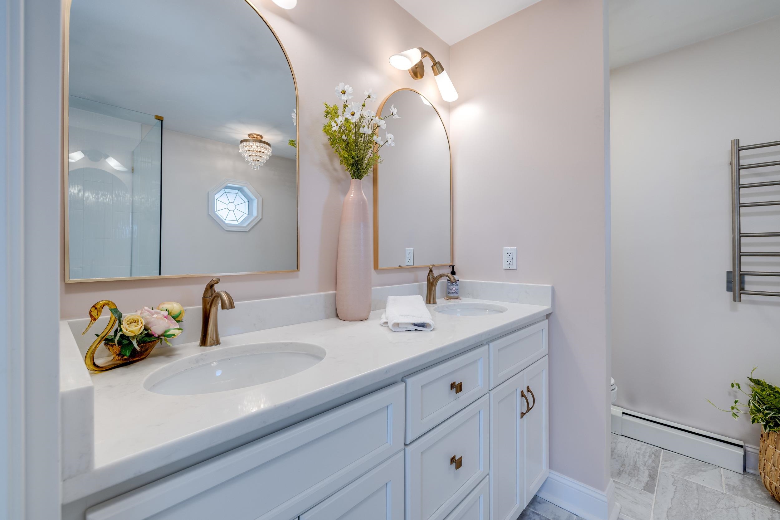 901 Riverside Avenue Grottoes, VA 24441 - Photo 45 of 75 a bathroom with a sink double vanity and a mirror