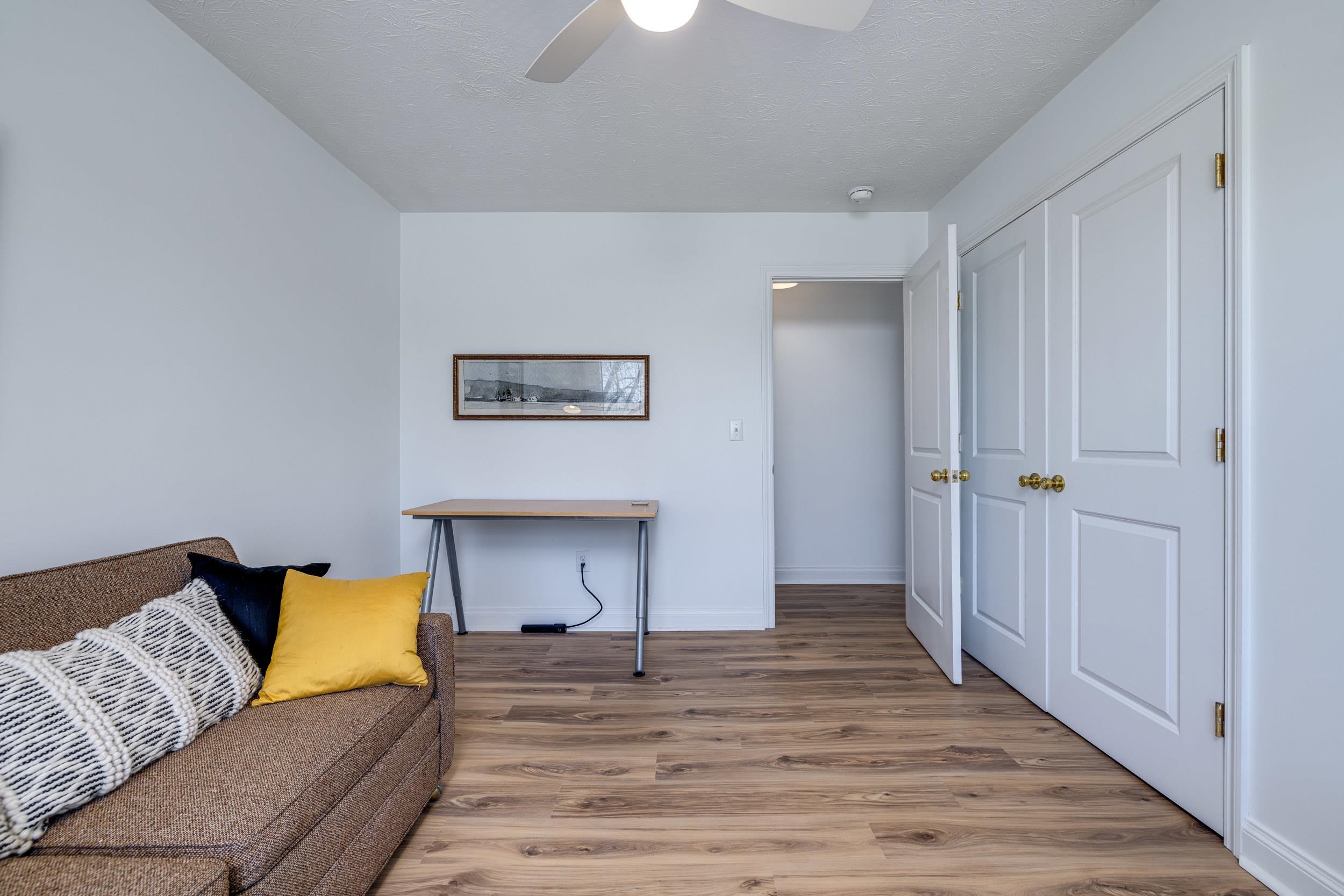 901 Riverside Avenue Grottoes, VA 24441 - Photo 54 of 75 a bedroom with a bed and a couch