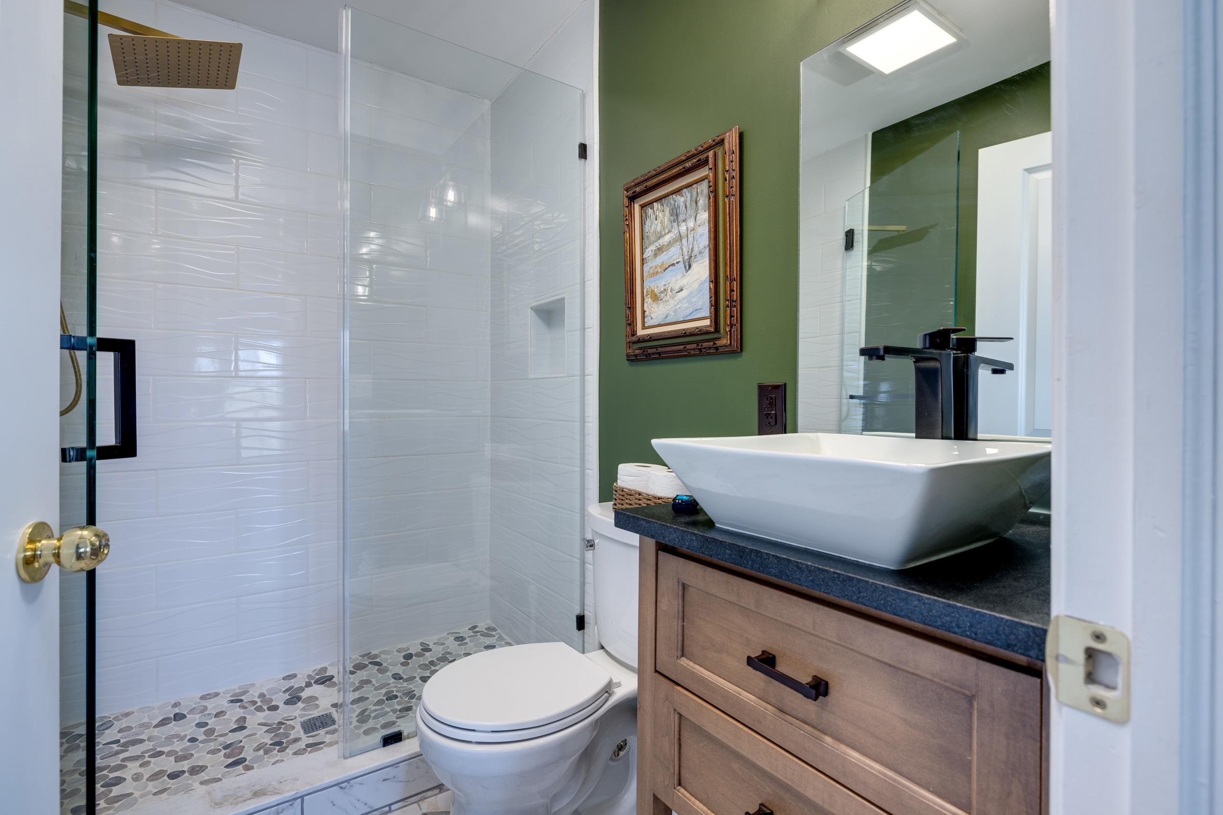 901 Riverside Avenue Grottoes, VA 24441 - Photo 55 of 75 a bathroom with a granite countertop toilet sink and mirror