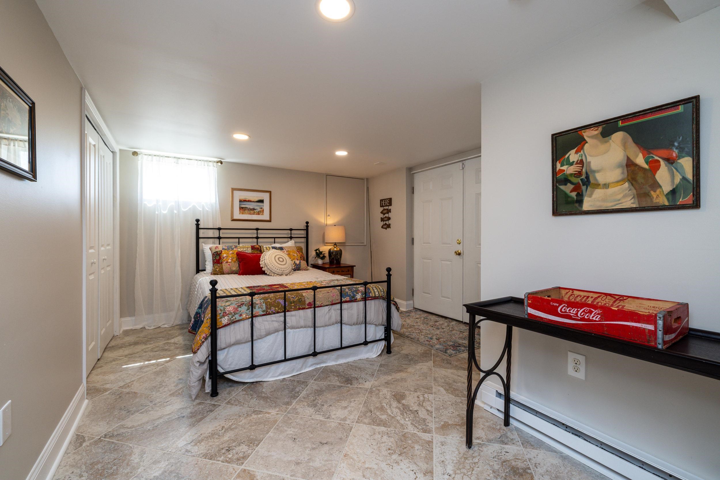 901 Riverside Avenue Grottoes, VA 24441 - Photo 64 of 75 a bedroom with furniture and a air conditioner vent