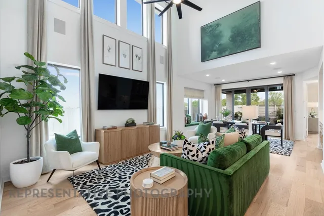 a kitchen with a sink a counter top stainless steel appliances and cabinets