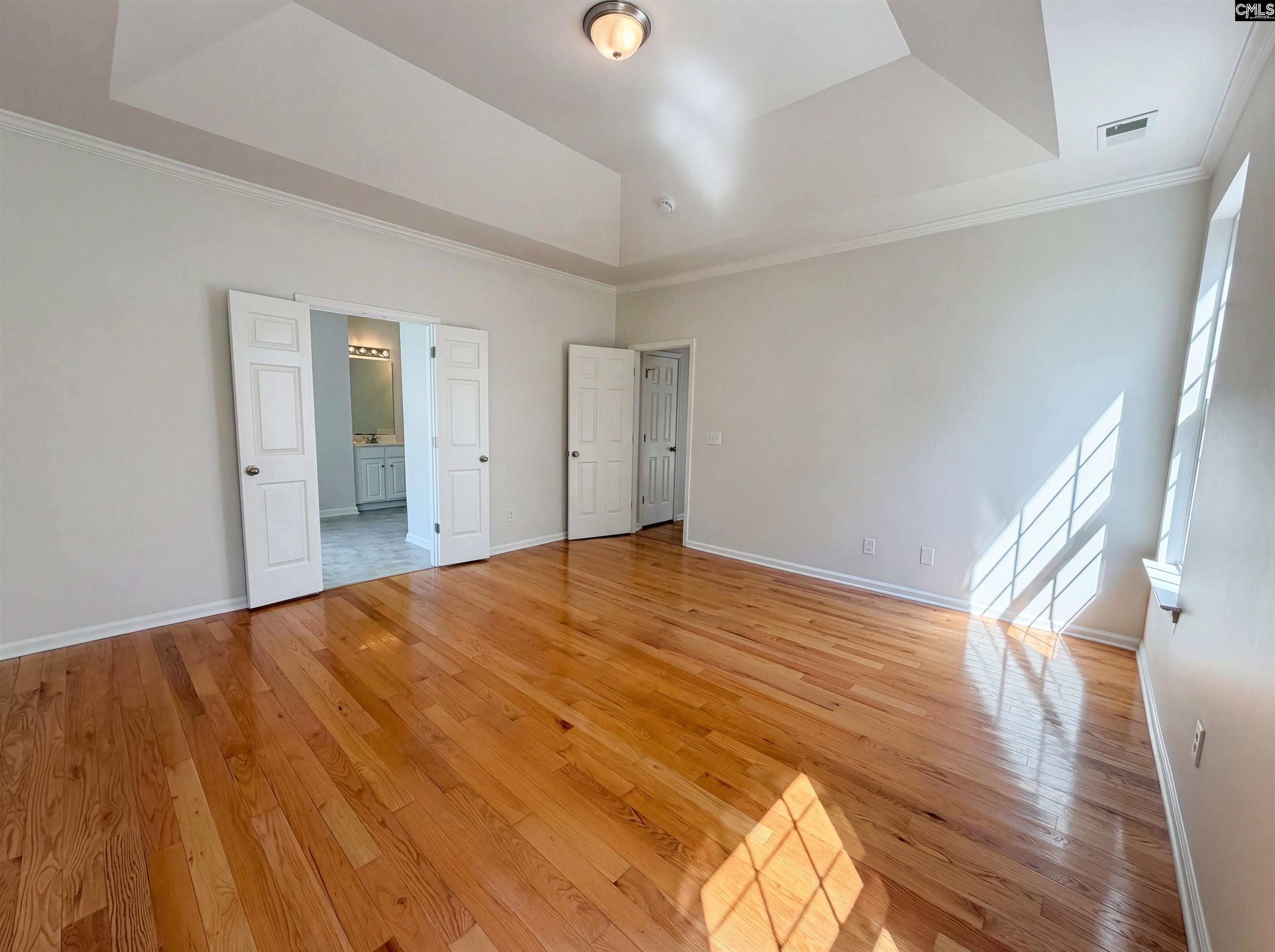 112 Coopers Hawk Circle Irmo, SC 29063 - Photo 4 of 26 a view of empty room with wooden floor