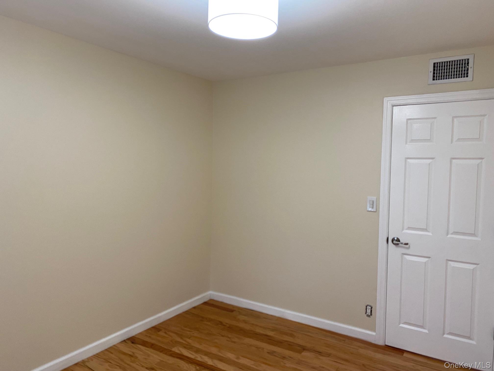 5 Smith Road Cornwall, NY 12518 - Photo 24 of 32 Bedroom 1 - with light hardwood floors and baseboards