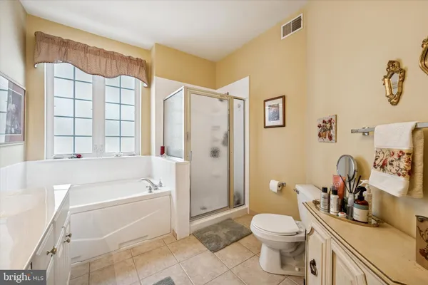 a bathroom with a sink a toilet and a bathtub