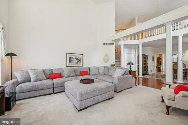 a living room with furniture and a couch
