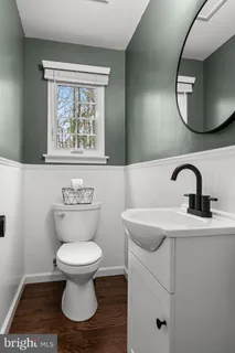 a bed room with a bed and a window