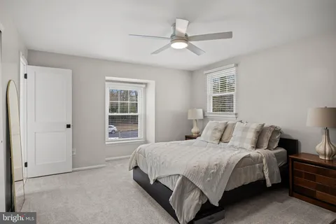 a bedroom with a bed and a cabinets