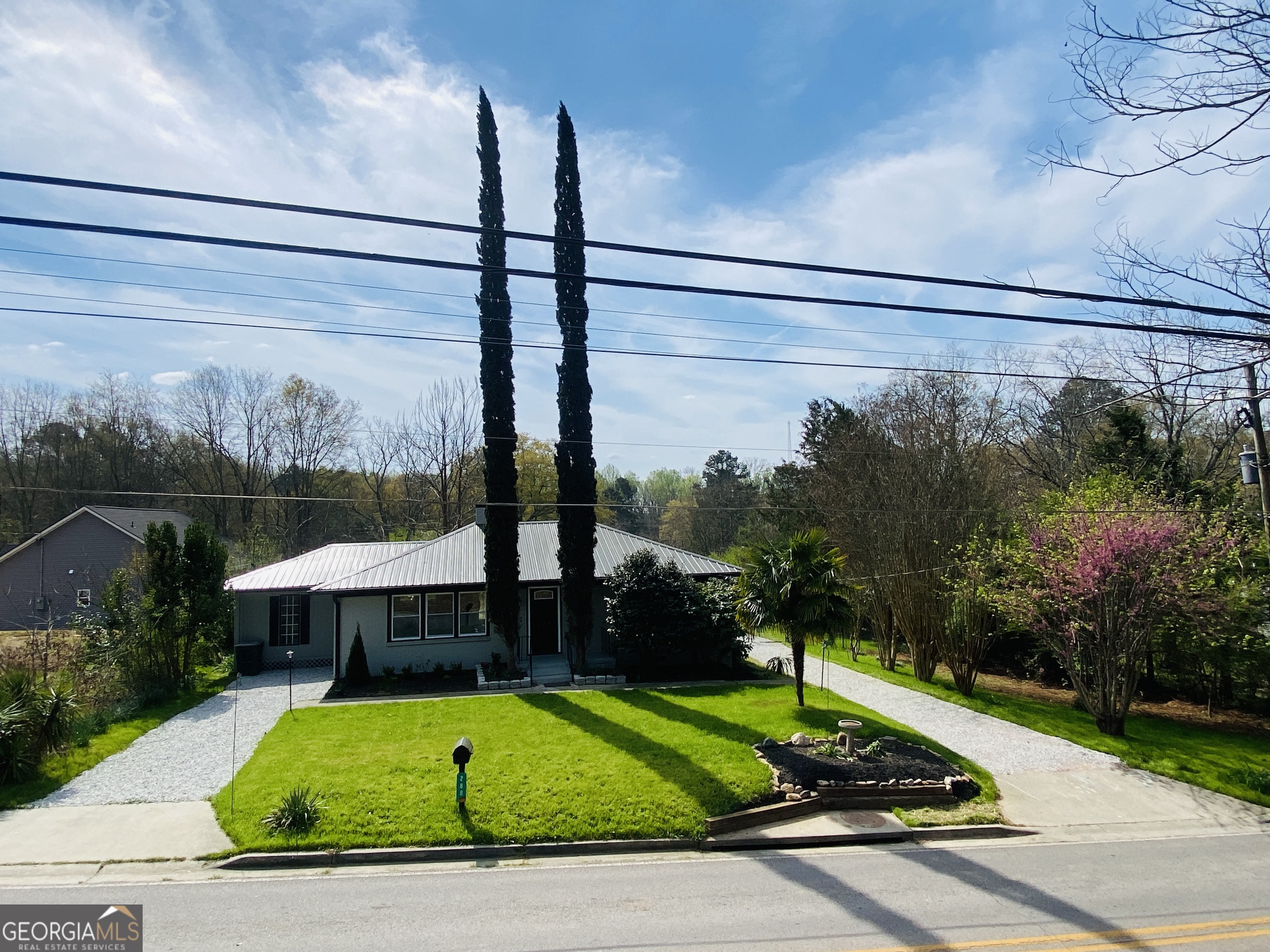 288 Davis Avenue Toccoa, GA 30577 - Photo 1 of 36 a view of a porch with a yard