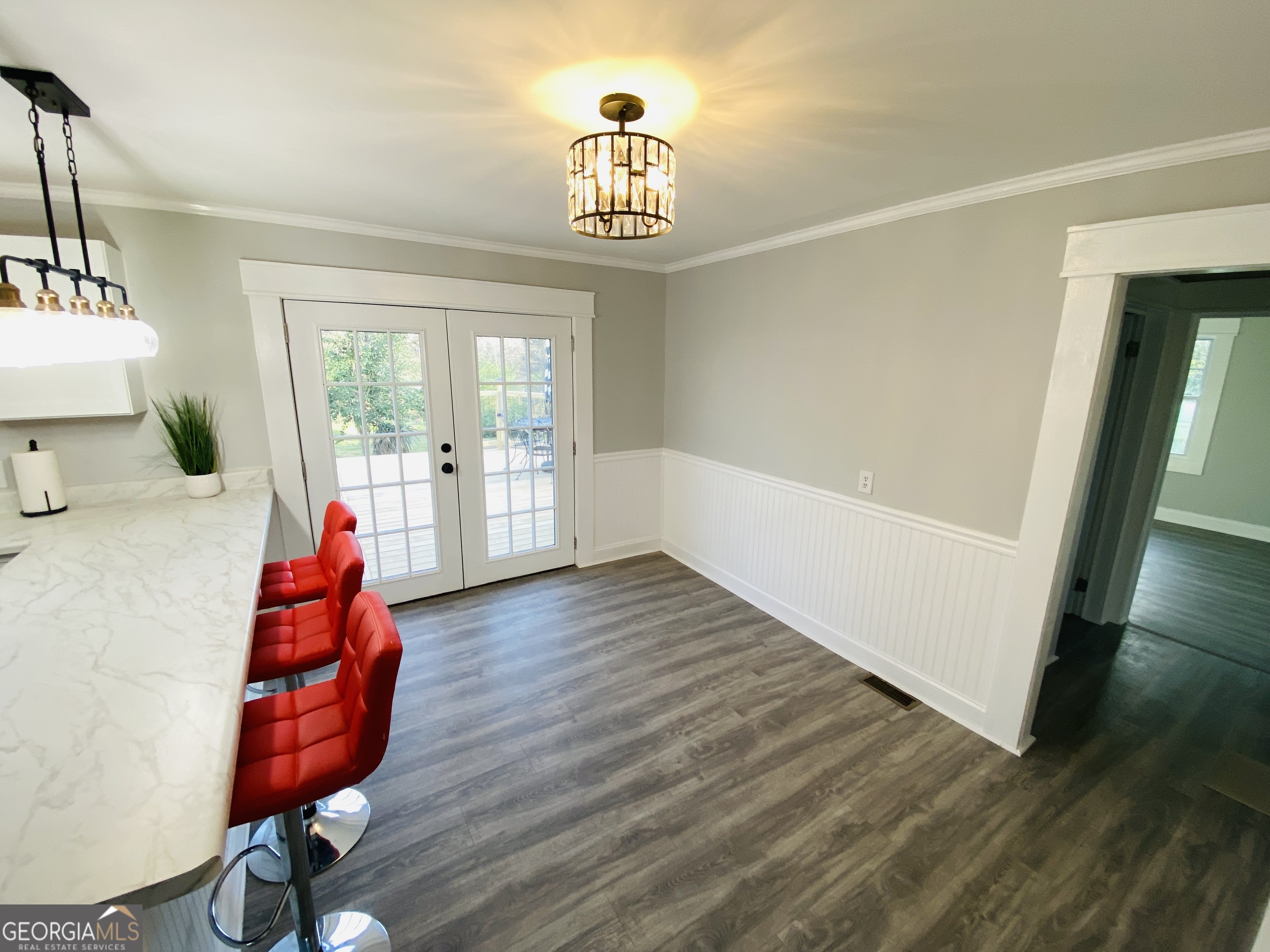 288 Davis Avenue Toccoa, GA 30577 - Photo 15 of 36 a living room with furniture and a chandelier