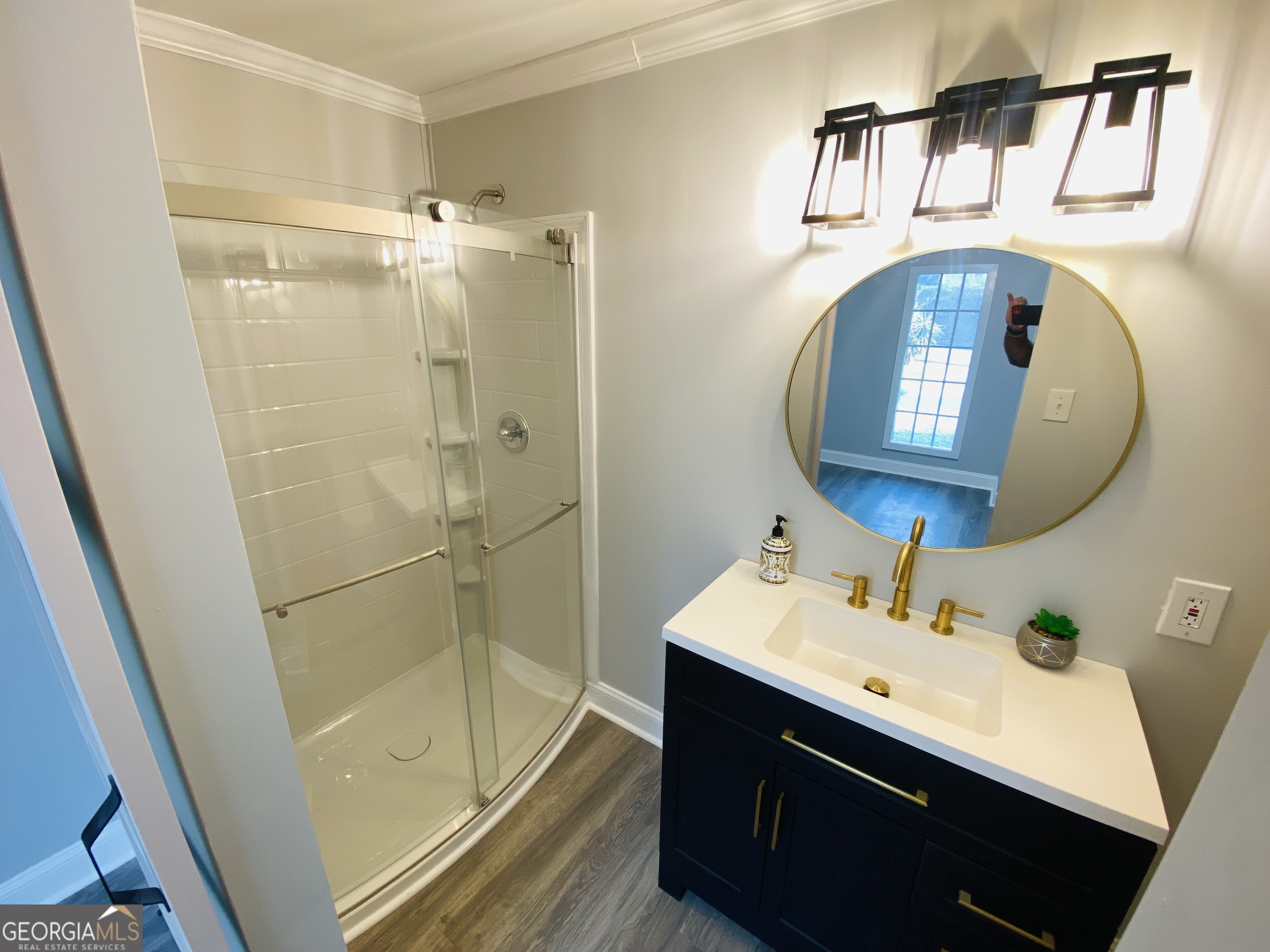288 Davis Avenue Toccoa, GA 30577 - Photo 25 of 36 a bathroom with a sink vanity and a mirror
