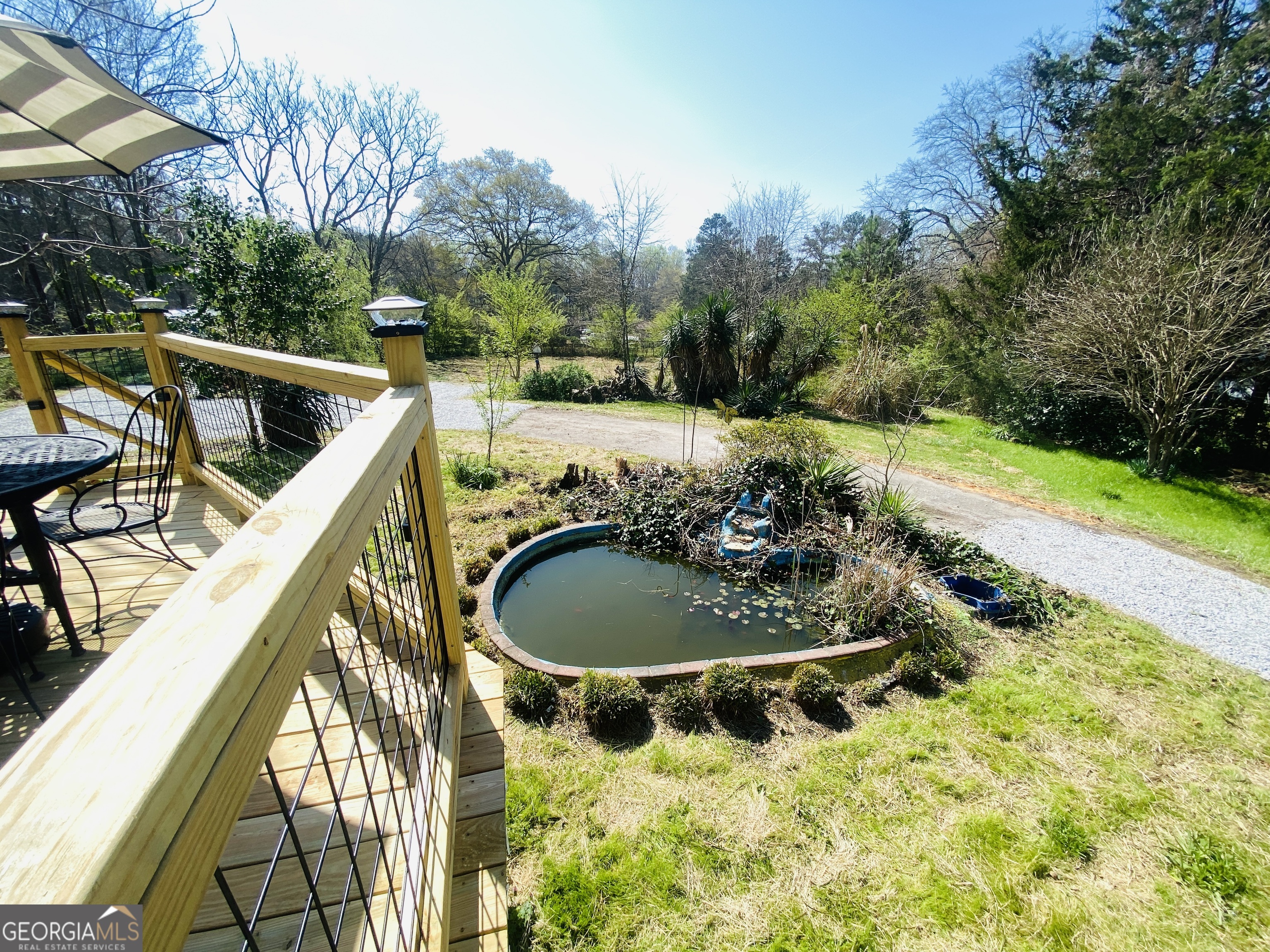288 Davis Avenue Toccoa, GA 30577 - Photo 30 of 36 a backyard of a house with yard and trampoline
