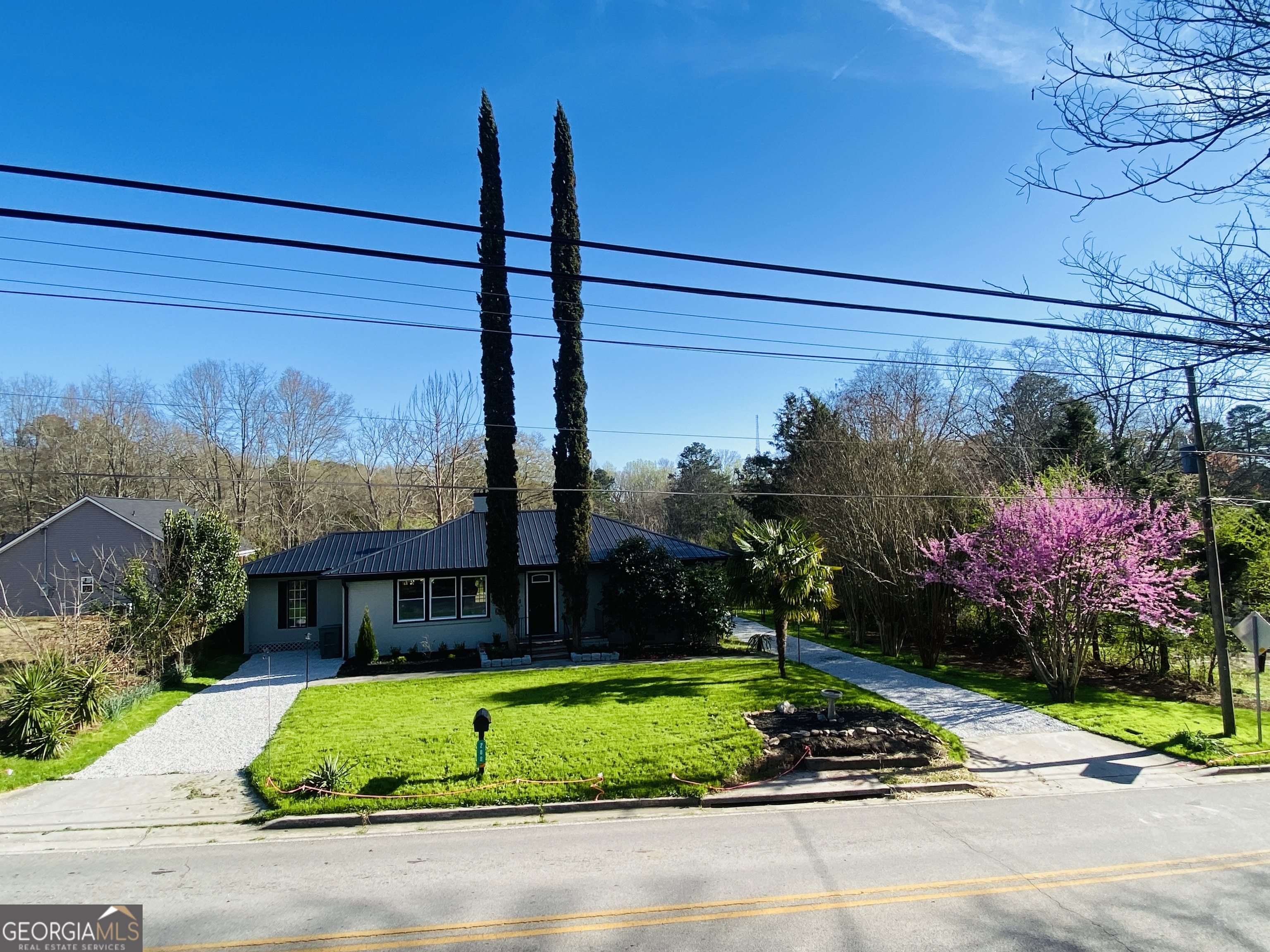 288 Davis Avenue Toccoa, GA 30577 - Photo 3 of 36 a view of a house with a yard