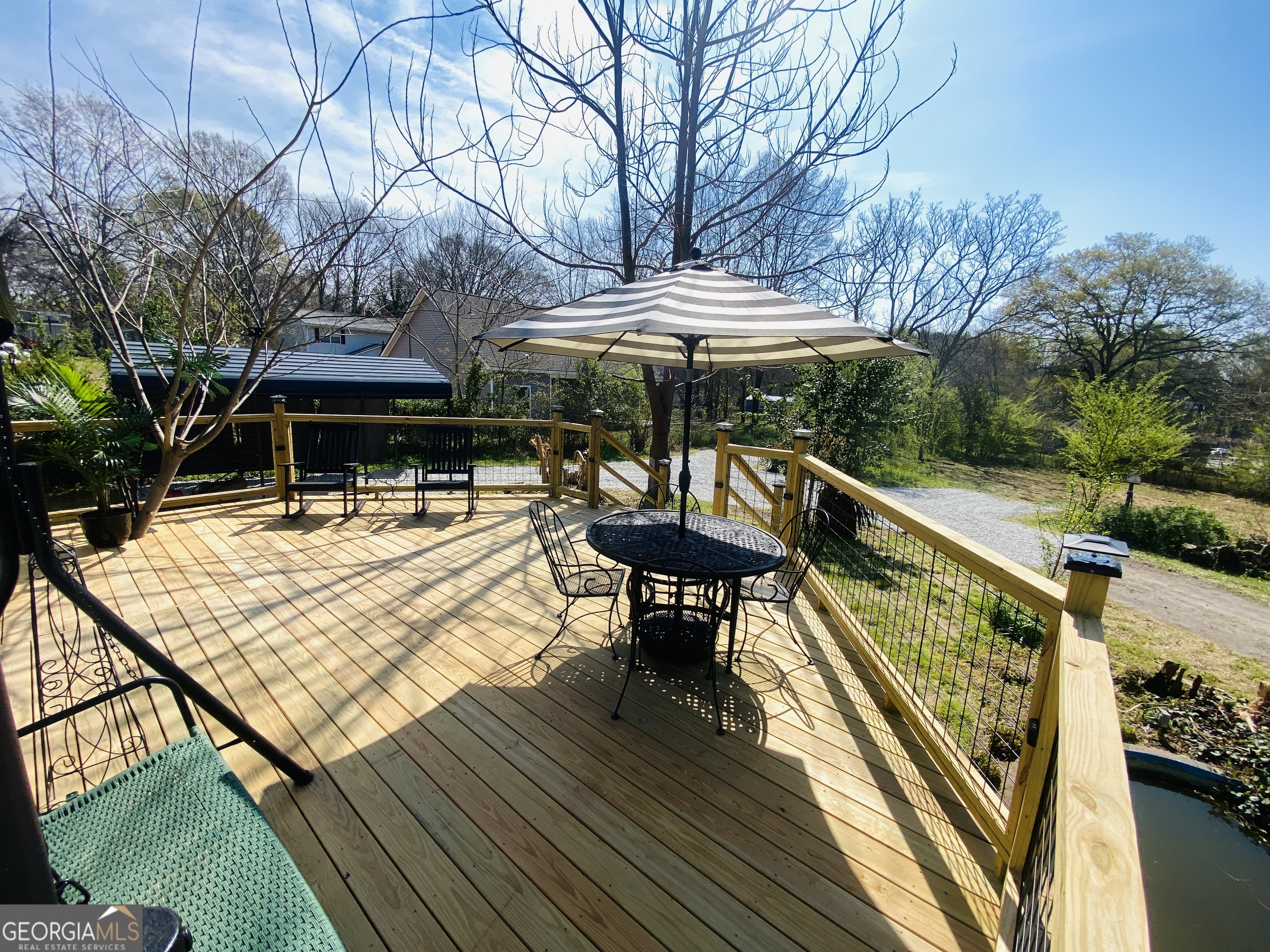 288 Davis Avenue Toccoa, GA 30577 - Photo 33 of 36 a view of house with patio outdoor seating