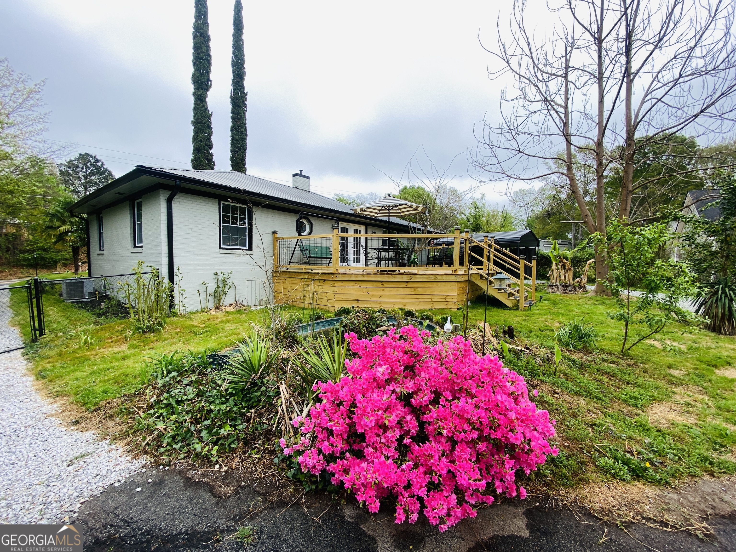 288 Davis Avenue Toccoa, GA 30577 - Photo 35 of 36 a front view of a house with garden