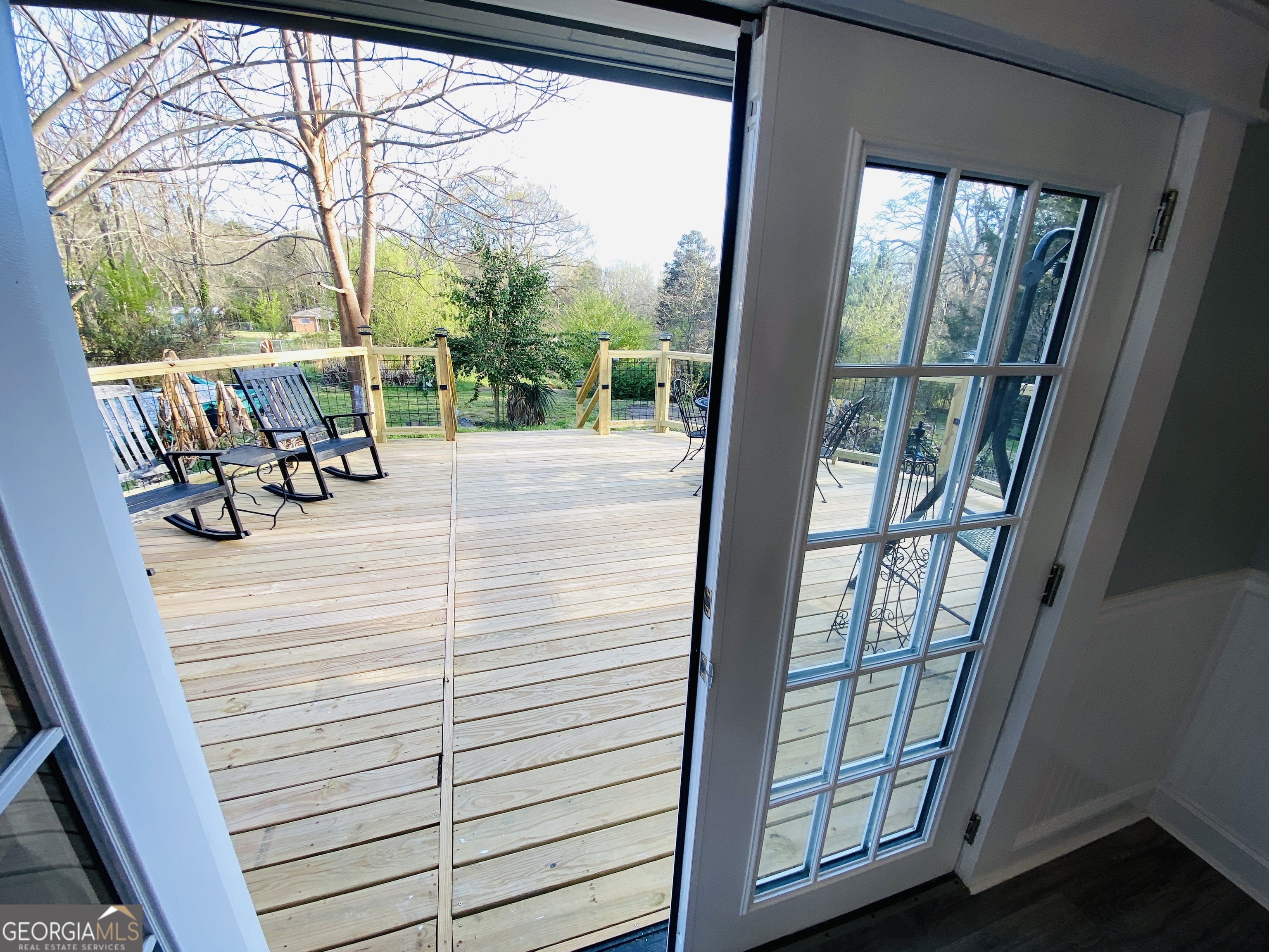 288 Davis Avenue Toccoa, GA 30577 - Photo 5 of 36 a view of a balcony with chairs