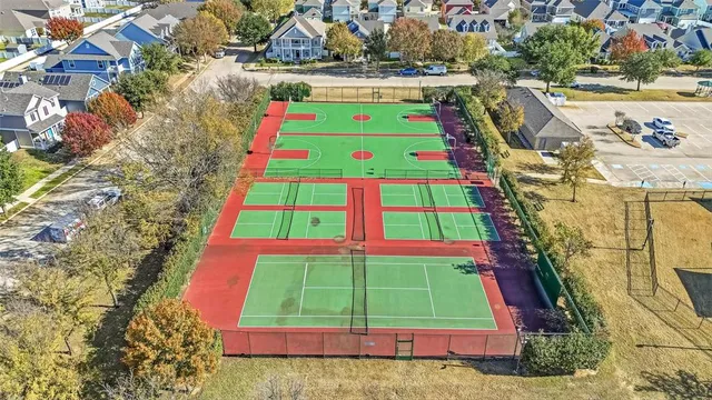 a view of a swimming pool with an outdoor seating