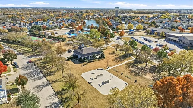an aerial view of residential building with parking space