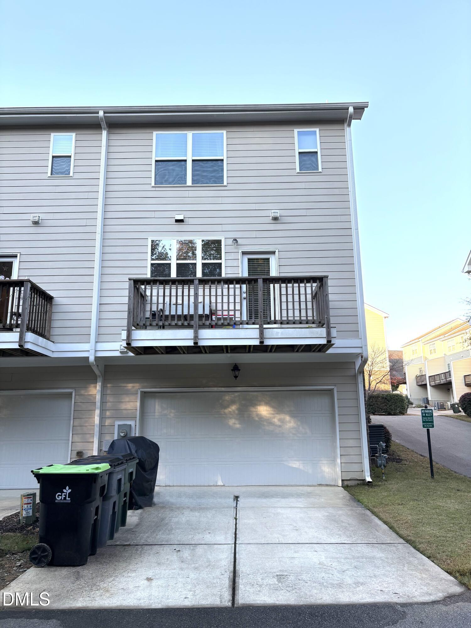 6038 Kentworth Drive Holly Springs, NC 27540 - Photo 7 of 10 a balcony with furniture and a potted plant