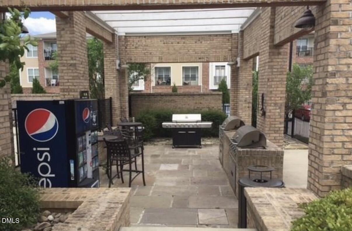 6038 Kentworth Drive Holly Springs, NC 27540 - Photo 10 of 10 a view of a house with backyard and sitting area