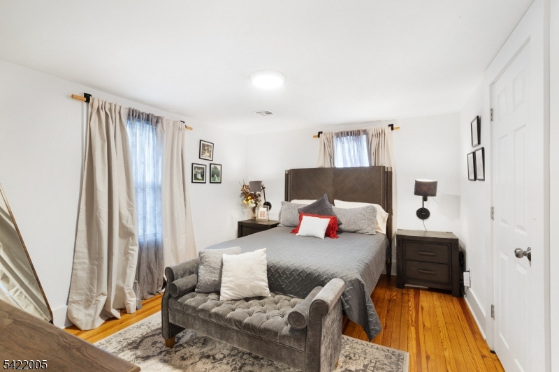 60 Searing Street Dover, NJ 07801 - Photo 14 of 23 a bedroom with a bed and a window