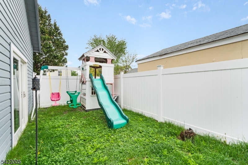 60 Searing Street Dover, NJ 07801 - Photo 21 of 23 a view of a slide with a slide