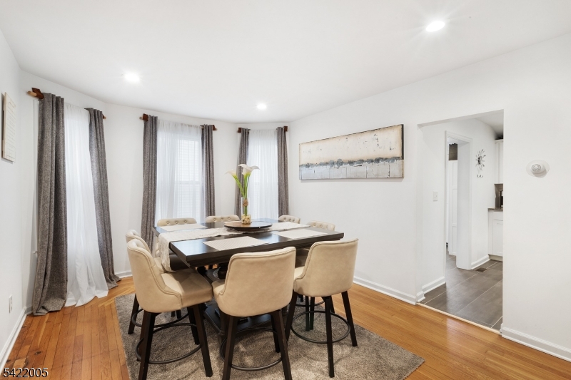 60 Searing Street Dover, NJ 07801 - Photo 7 of 23 a view of a dining room with furniture and wooden floor