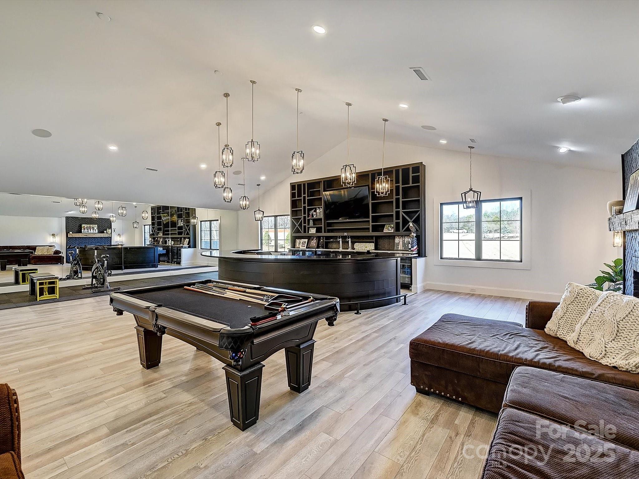 1525 Shinnville Road Cleveland, NC 27013 - Photo 16 of 48 a living room with furniture a flat screen tv and kitchen view