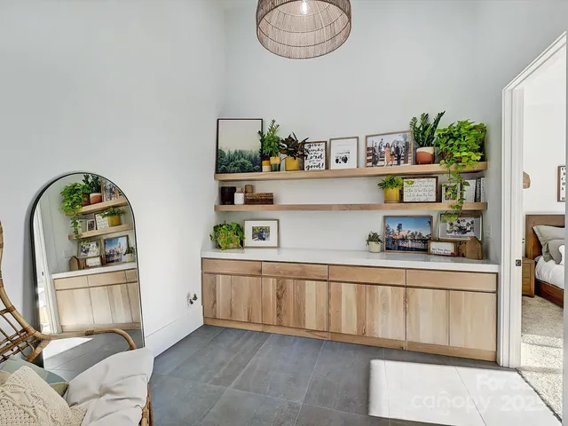 a kitchen with a sink and cabinets