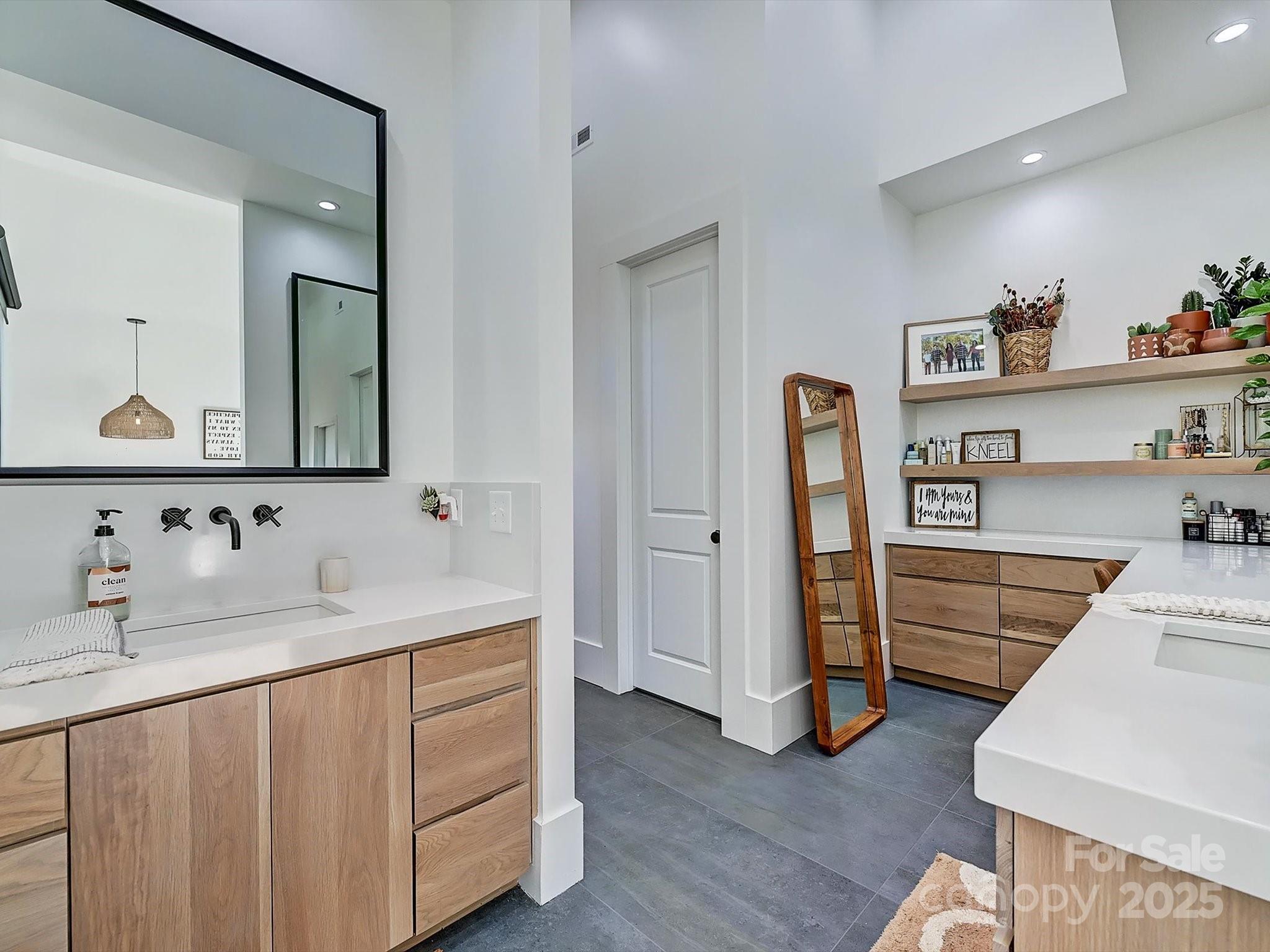 1525 Shinnville Road Cleveland, NC 27013 - Photo 32 of 48 a bathroom with a sink and a mirror
