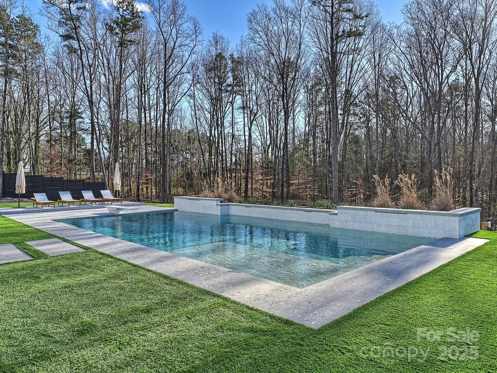 1525 Shinnville Road Cleveland, NC 27013 - Photo 36 of 48 a view of a backyard with swimming pool