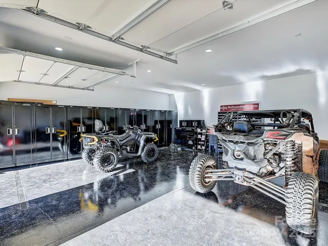 a livingroom with furniture and a flat screen tv