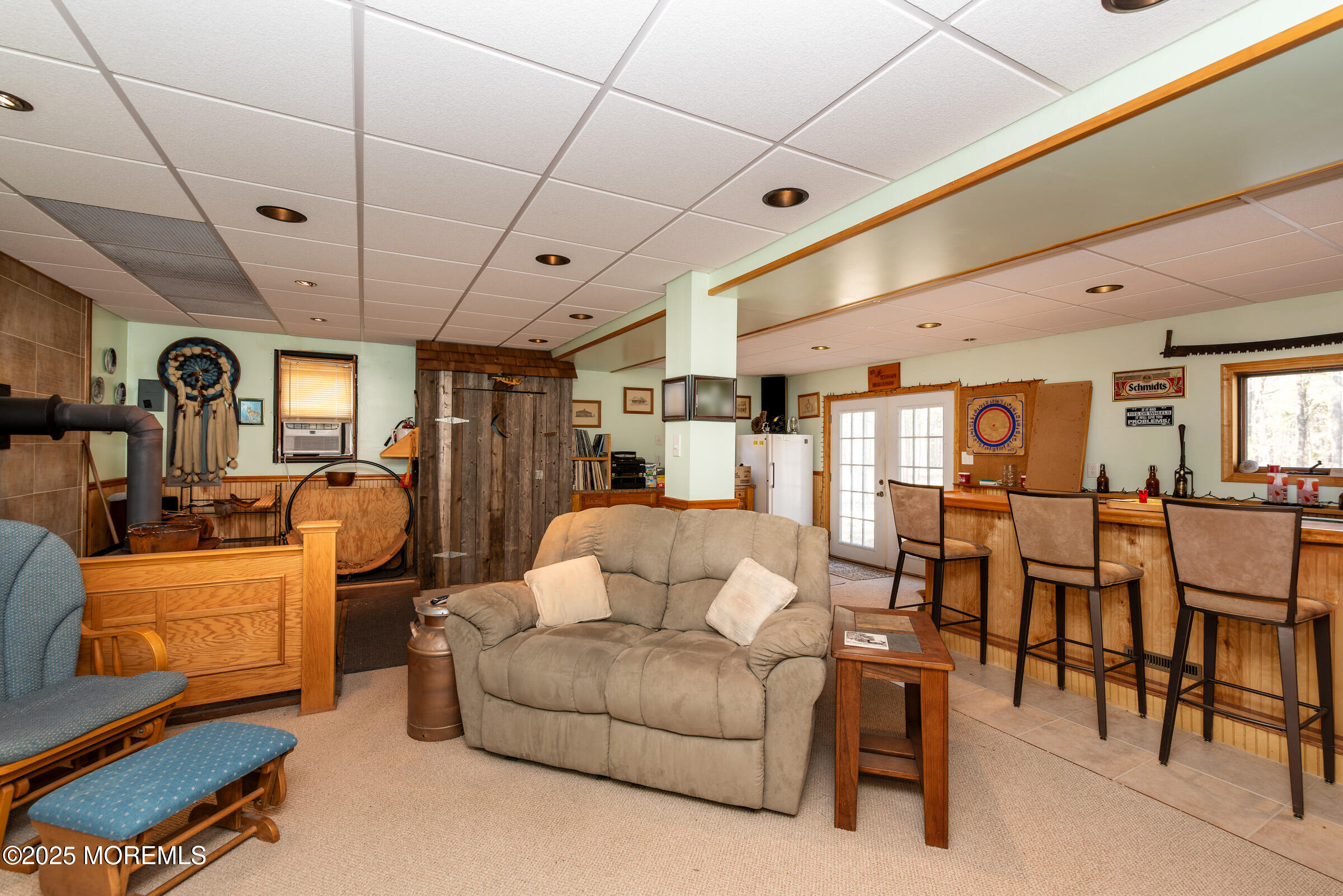 220 Chatsworth Tuckerton Road, Unit A Chatsworth, NJ 08019 - Photo 12 of 59 a living room with furniture kitchen view and a chandelier