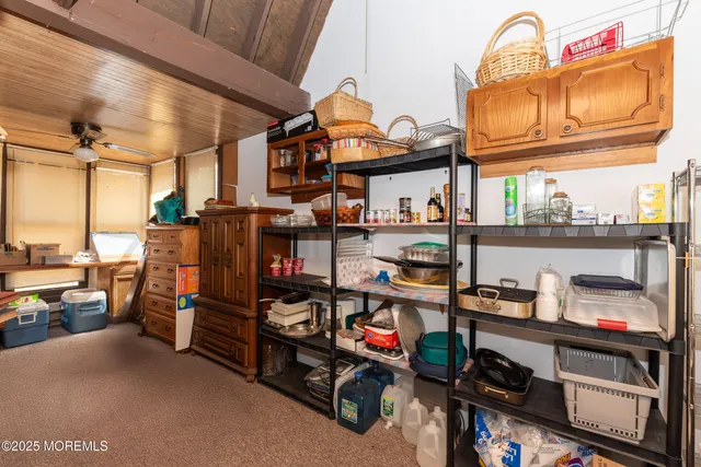 a bathroom with a sink toilet and mirror