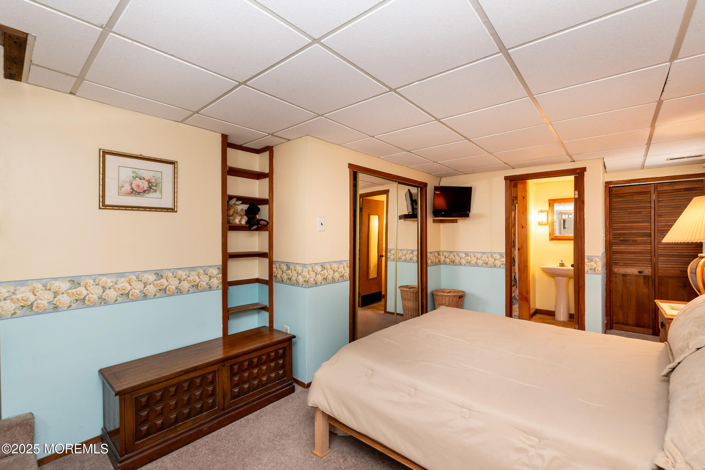 220 Chatsworth Tuckerton Road, Unit A Chatsworth, NJ 08019 - Photo 17 of 59 a bedroom with a bed a dresser next to a window