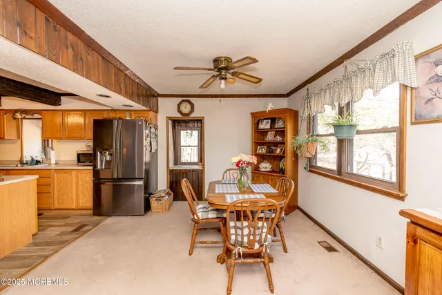 a kitchen with stainless steel appliances a stove sink and cabinets