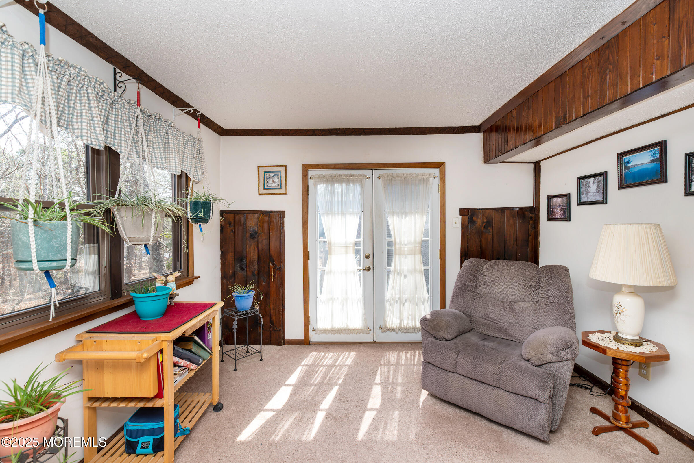 220 Chatsworth Tuckerton Road, Unit A Chatsworth, NJ 08019 - Photo 24 of 59 a living room with furniture and a flat screen tv