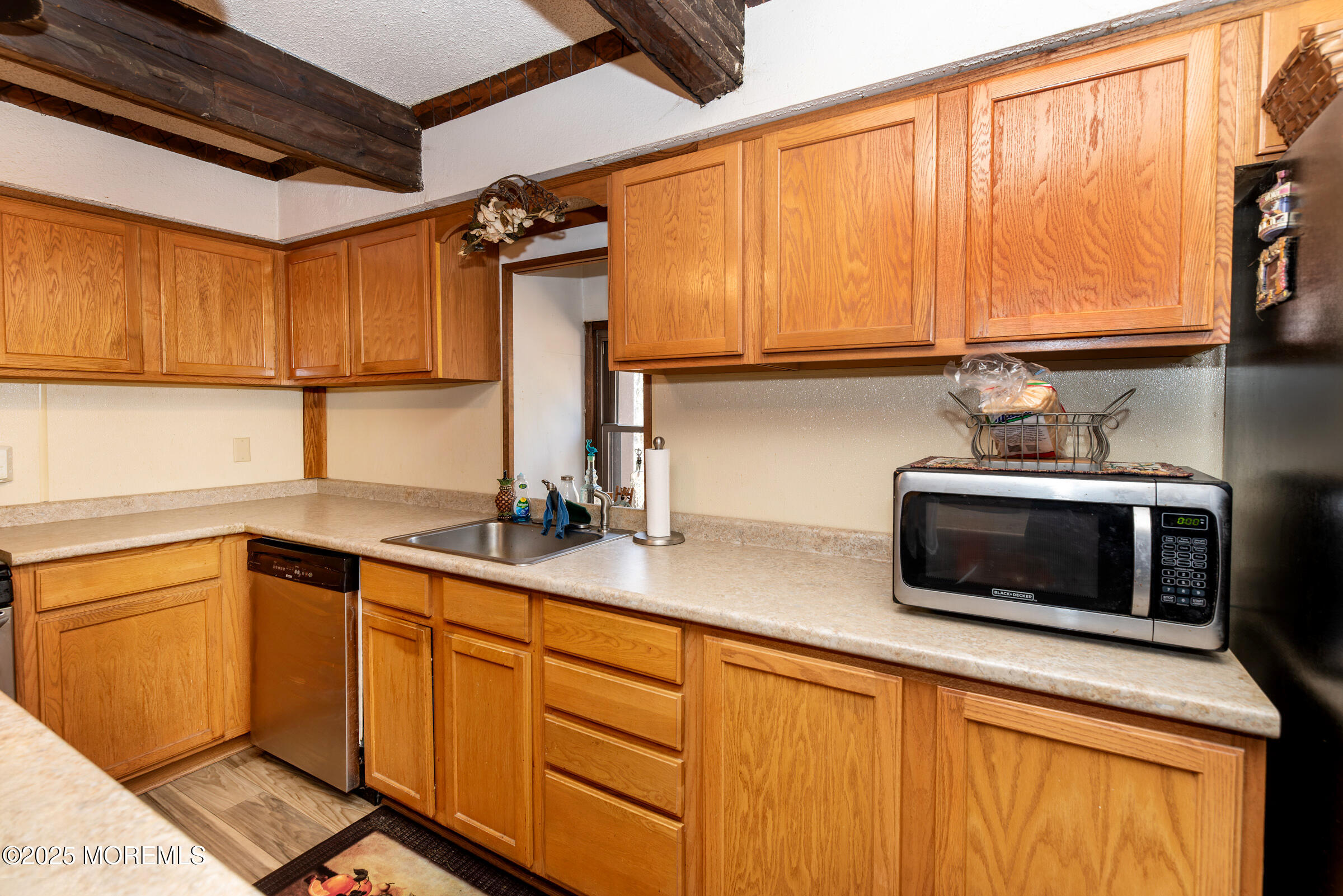 220 Chatsworth Tuckerton Road, Unit A Chatsworth, NJ 08019 - Photo 29 of 59 a kitchen with stainless steel appliances a stove sink and cabinets