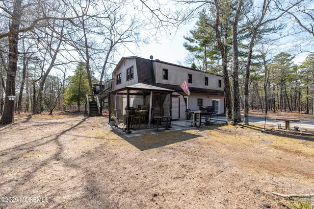 a kitchen with stainless steel appliances granite countertop a refrigerator and a stove