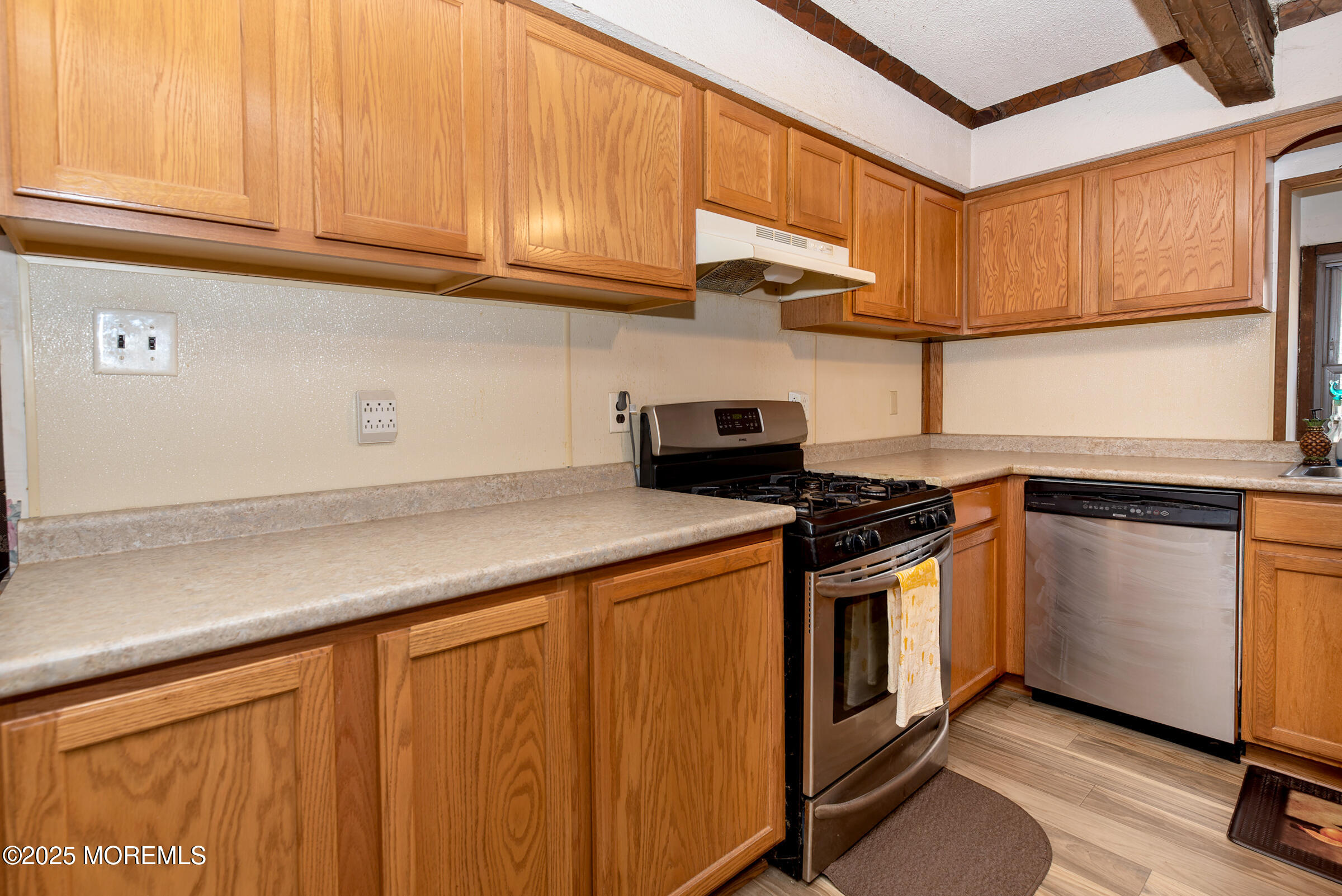 220 Chatsworth Tuckerton Road, Unit A Chatsworth, NJ 08019 - Photo 32 of 59 a kitchen with stainless steel appliances granite countertop a stove a sink and a microwave