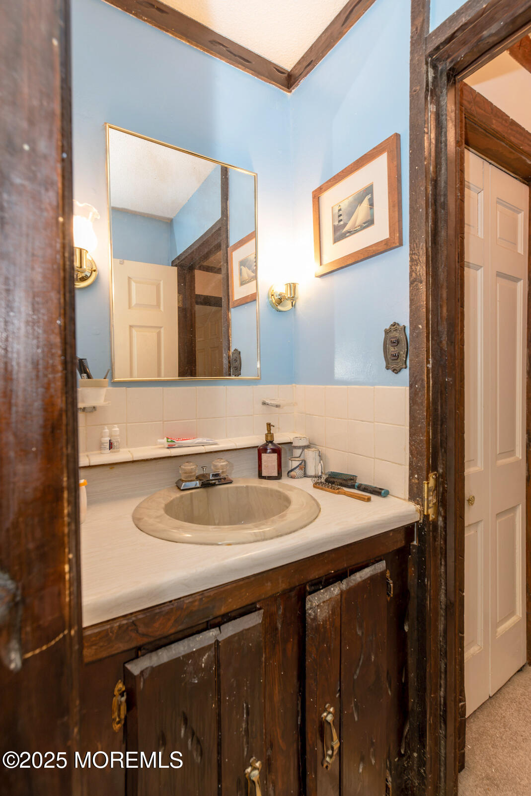 220 Chatsworth Tuckerton Road, Unit A Chatsworth, NJ 08019 - Photo 46 of 59 a bathroom with a sink and a mirror
