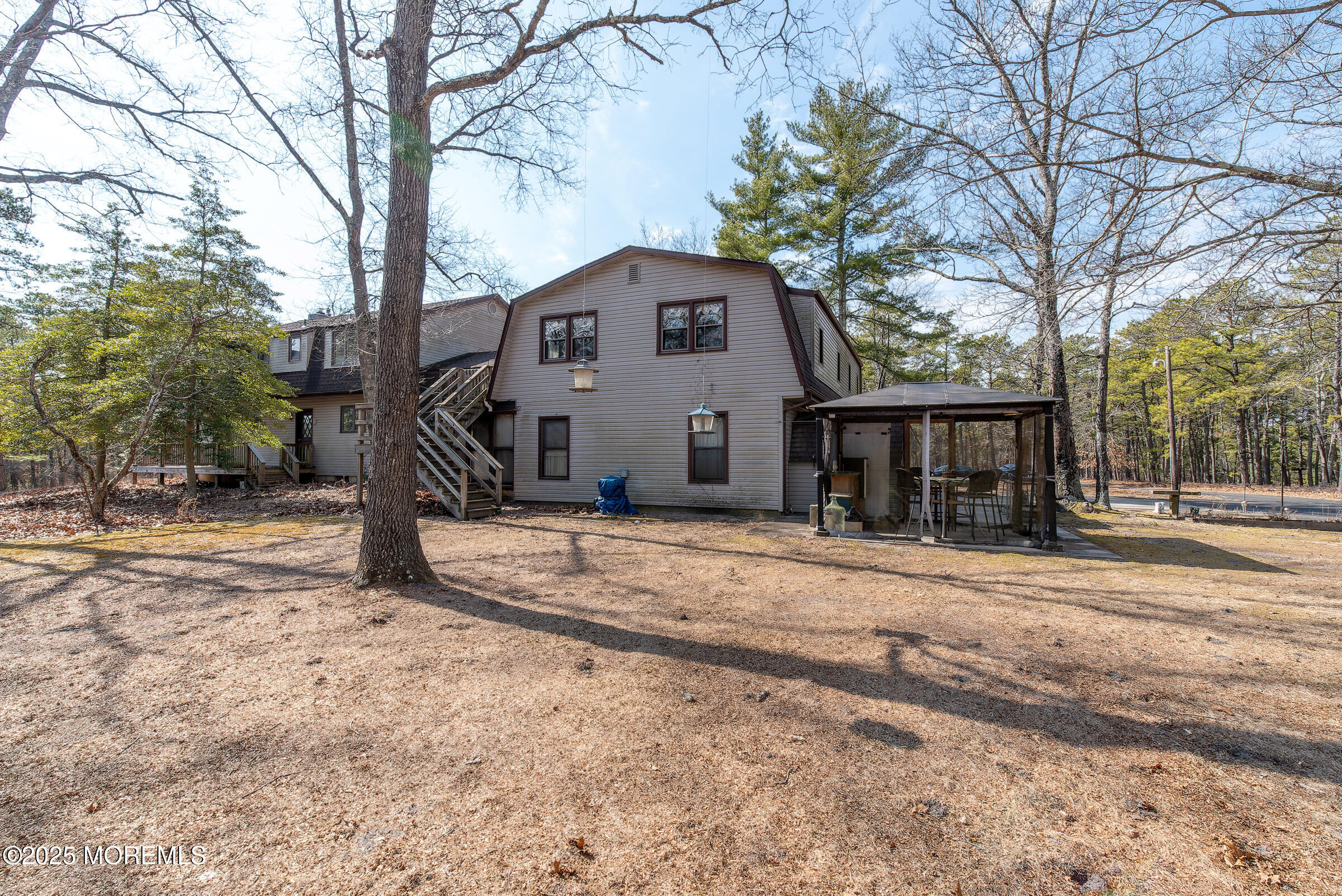 220 Chatsworth Tuckerton Road, Unit A Chatsworth, NJ 08019 - Photo 54 of 59 a view of a house with a yard covered in snow