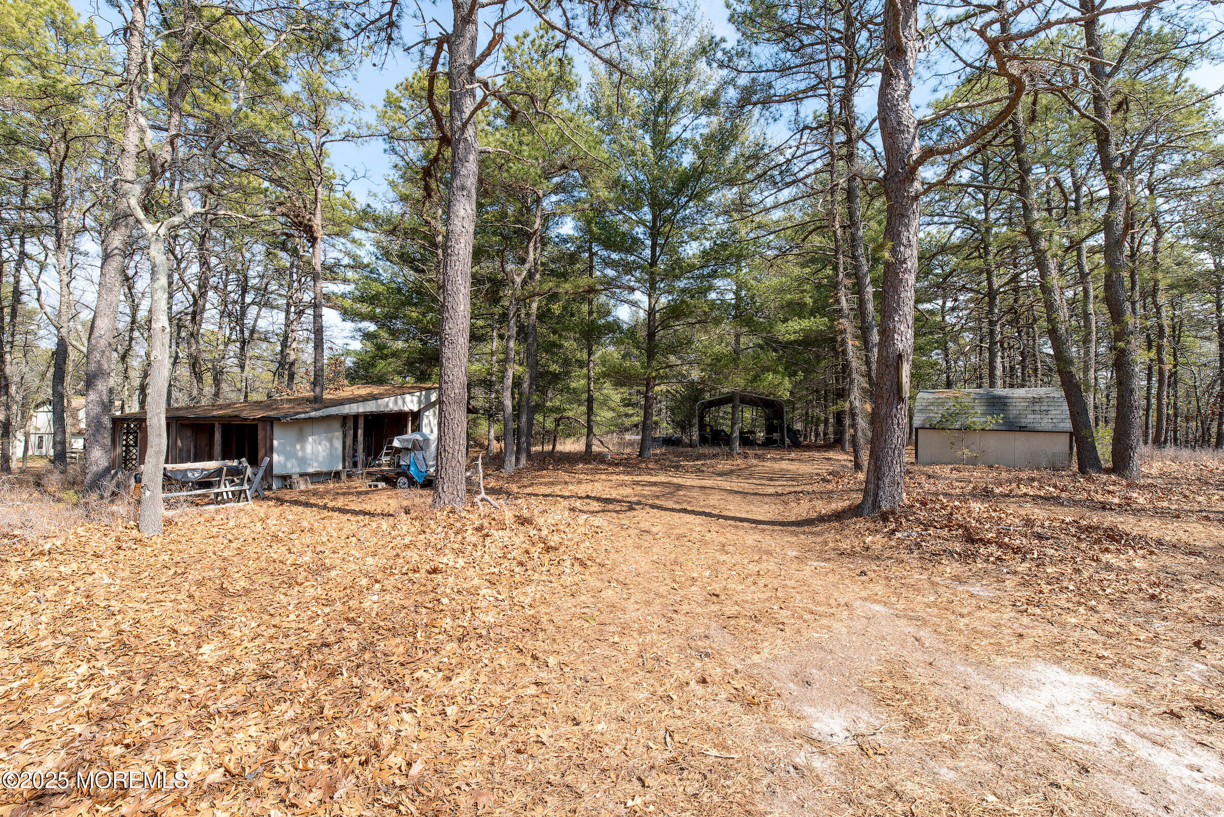 220 Chatsworth Tuckerton Road, Unit A Chatsworth, NJ 08019 - Photo 57 of 59 a view of a house with trees in the background