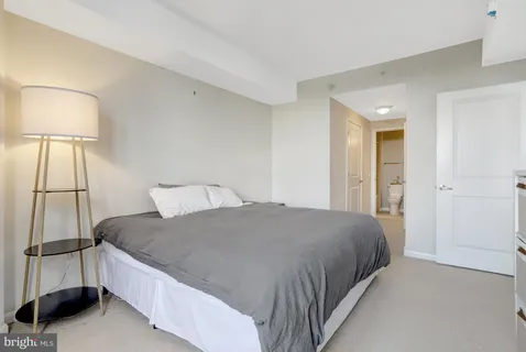 a view of a bedroom with closet area