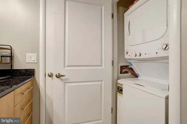 a view of a swimming pool with chairs