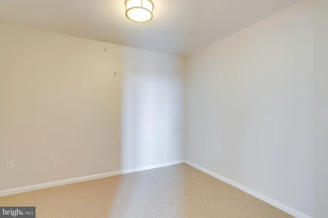 a view of a balcony with wooden floor