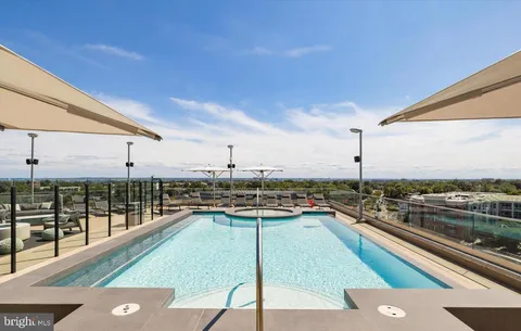 a view of a terrace with furniture and a patio